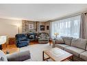 635 Marian Crescent Ne, Calgary, AB  - Indoor Photo Showing Living Room 