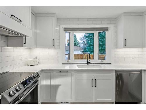 103 Woodpark Place Sw, Calgary, AB - Indoor Photo Showing Kitchen