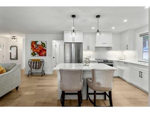 103 Woodpark Place Sw, Calgary, AB - Indoor Photo Showing Kitchen With Stainless Steel Kitchen With Upgraded Kitchen