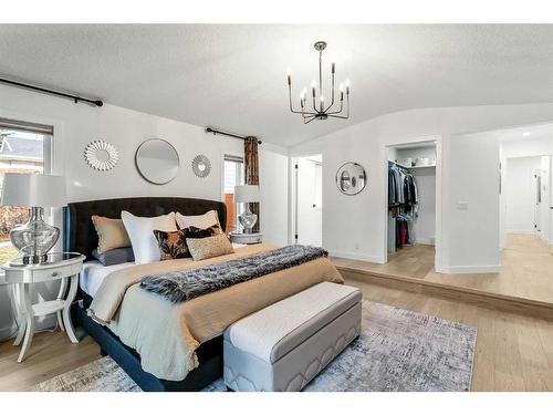 103 Woodpark Place Sw, Calgary, AB - Indoor Photo Showing Bedroom