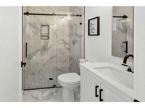 103 Woodpark Place Sw, Calgary, AB - Indoor Photo Showing Bathroom