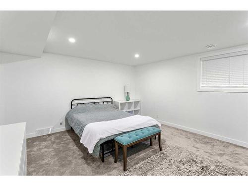 103 Woodpark Place Sw, Calgary, AB - Indoor Photo Showing Bedroom