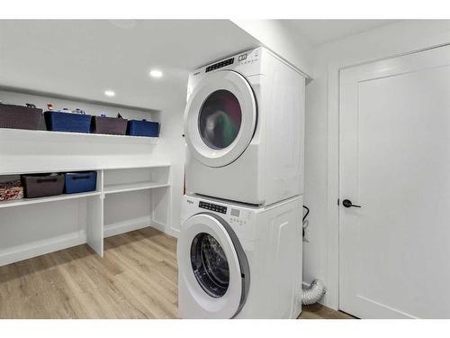 103 Woodpark Place Sw, Calgary, AB - Indoor Photo Showing Laundry Room