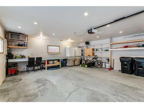 103 Woodpark Place Sw, Calgary, AB - Indoor Photo Showing Garage