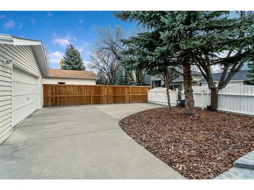 103 Woodpark Place Sw, Calgary, AB - Outdoor