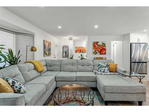 103 Woodpark Place Sw, Calgary, AB - Indoor Photo Showing Living Room