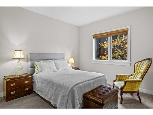 109-707 Spring Creek Drive, Canmore, AB - Indoor Photo Showing Bedroom