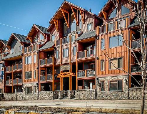 109-707 Spring Creek Drive, Canmore, AB - Outdoor With Facade