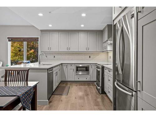 109-707 Spring Creek Drive, Canmore, AB - Indoor Photo Showing Kitchen