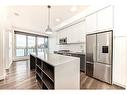 903-327 9A Street Nw, Calgary, AB  - Indoor Photo Showing Kitchen With Stainless Steel Kitchen With Upgraded Kitchen 