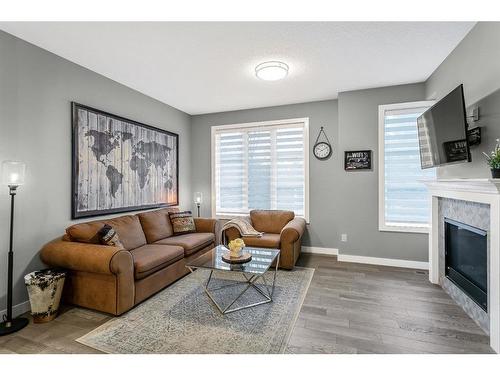 1934 26A Street Sw, Calgary, AB - Indoor Photo Showing Living Room With Fireplace