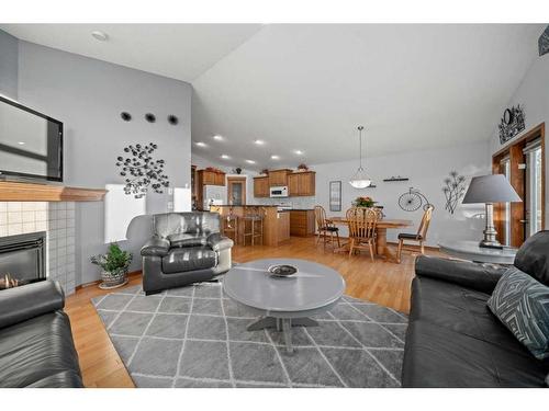 113 Pantego Road Nw, Calgary, AB - Indoor Photo Showing Living Room With Fireplace