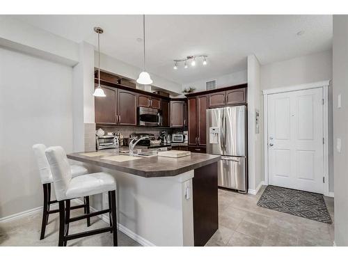 3107-4 Kingsland Close Se, Airdrie, AB - Indoor Photo Showing Kitchen