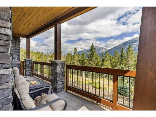 115-106 Stewart Creek Rise, Canmore, AB - Outdoor With Deck Patio Veranda With Exterior