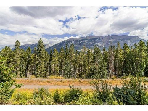 115-106 Stewart Creek Rise, Canmore, AB - Outdoor With View