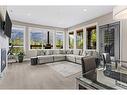 115-106 Stewart Creek Rise, Canmore, AB  - Indoor Photo Showing Living Room With Fireplace 