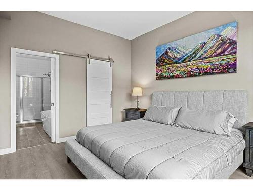 115-106 Stewart Creek Rise, Canmore, AB - Indoor Photo Showing Bedroom