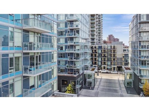 502-118 Waterfront Court Sw, Calgary, AB - Outdoor With Balcony With Facade