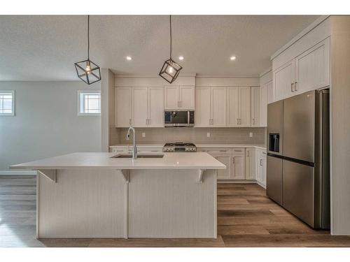 151 Amblefield Avenue Nw, Calgary, AB - Indoor Photo Showing Kitchen