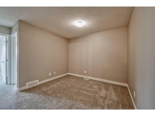 151 Amblefield Avenue Nw, Calgary, AB - Indoor Photo Showing Other Room