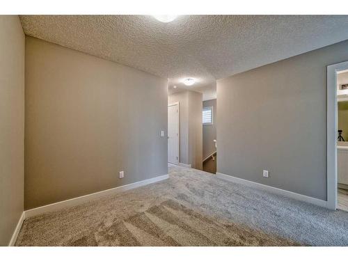 151 Amblefield Avenue Nw, Calgary, AB - Indoor Photo Showing Other Room