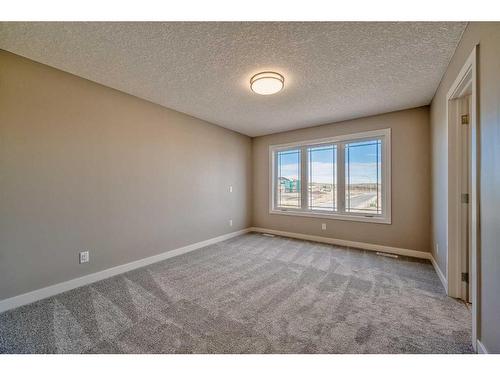 151 Amblefield Avenue Nw, Calgary, AB - Indoor Photo Showing Other Room