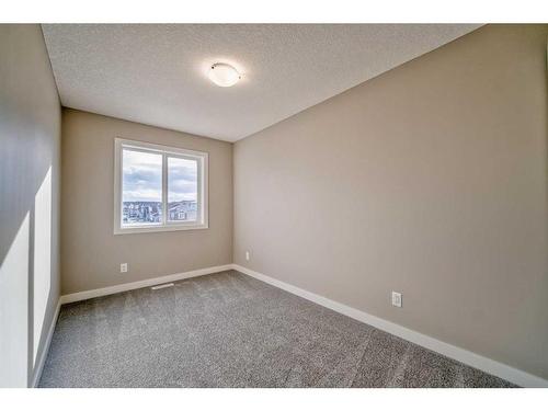 151 Amblefield Avenue Nw, Calgary, AB - Indoor Photo Showing Other Room