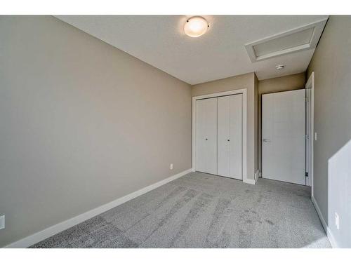 151 Amblefield Avenue Nw, Calgary, AB - Indoor Photo Showing Other Room