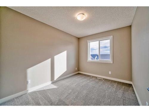 151 Amblefield Avenue Nw, Calgary, AB - Indoor Photo Showing Other Room