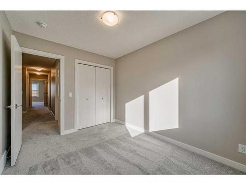 151 Amblefield Avenue Nw, Calgary, AB - Indoor Photo Showing Other Room