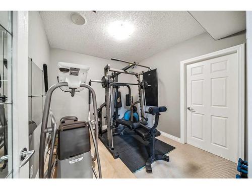 315 Simcrest Heights Sw, Calgary, AB - Indoor Photo Showing Gym Room