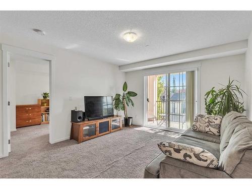 4211-755 Copperpond Boulevard Se, Calgary, AB - Indoor Photo Showing Living Room