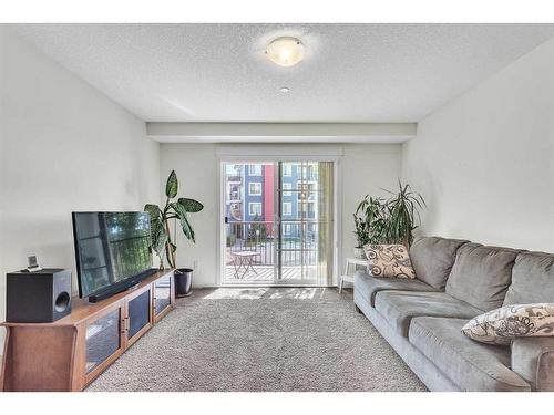 4211-755 Copperpond Boulevard Se, Calgary, AB - Indoor Photo Showing Living Room