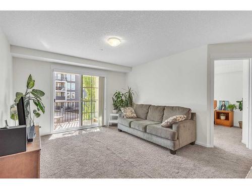 4211-755 Copperpond Boulevard Se, Calgary, AB - Indoor Photo Showing Living Room