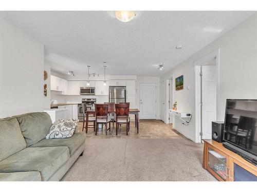 4211-755 Copperpond Boulevard Se, Calgary, AB - Indoor Photo Showing Living Room