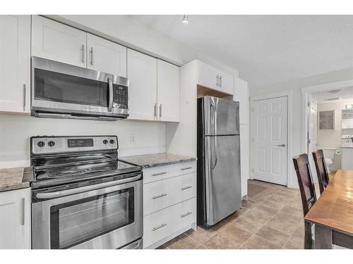 4211-755 Copperpond Boulevard Se, Calgary, AB - Indoor Photo Showing Kitchen With Stainless Steel Kitchen