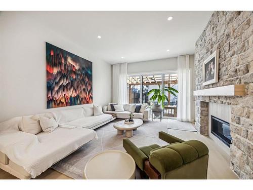 1816 Elizabeth Street Se, Calgary, AB - Indoor Photo Showing Living Room With Fireplace