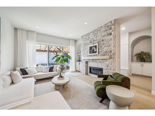 1816 Elizabeth Street Se, Calgary, AB - Indoor Photo Showing Living Room With Fireplace