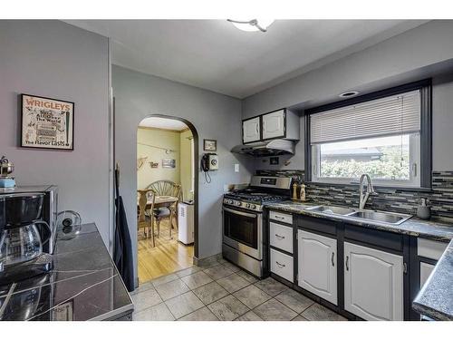 523 35A Street Nw, Calgary, AB - Indoor Photo Showing Kitchen With Double Sink