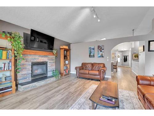 176 Chaparral Crescent Se, Calgary, AB - Indoor Photo Showing Living Room With Fireplace