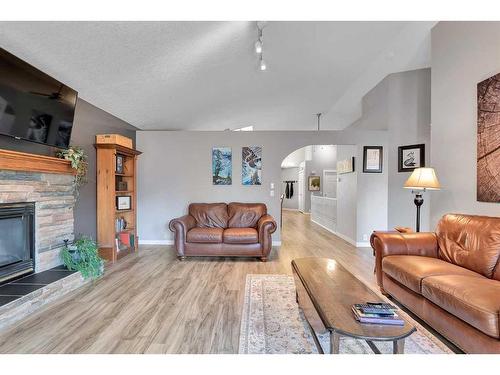 176 Chaparral Crescent Se, Calgary, AB - Indoor Photo Showing Living Room With Fireplace