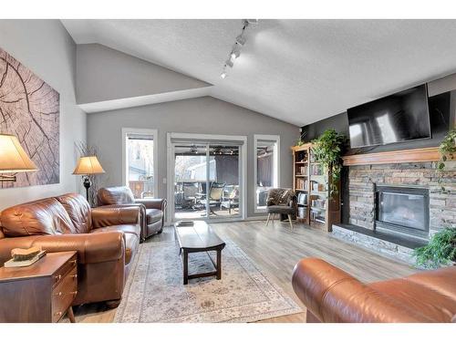 176 Chaparral Crescent Se, Calgary, AB - Indoor Photo Showing Living Room With Fireplace