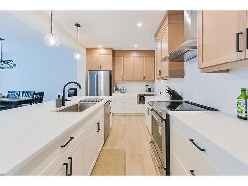 153 Cranbrook Cove Se, Calgary, AB - Indoor Photo Showing Kitchen With Upgraded Kitchen