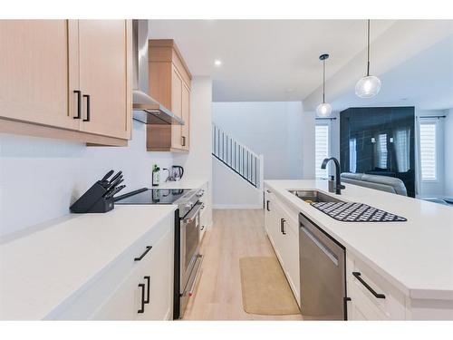 153 Cranbrook Cove Se, Calgary, AB - Indoor Photo Showing Kitchen With Upgraded Kitchen