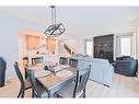 153 Cranbrook Cove Se, Calgary, AB  - Indoor Photo Showing Dining Room 