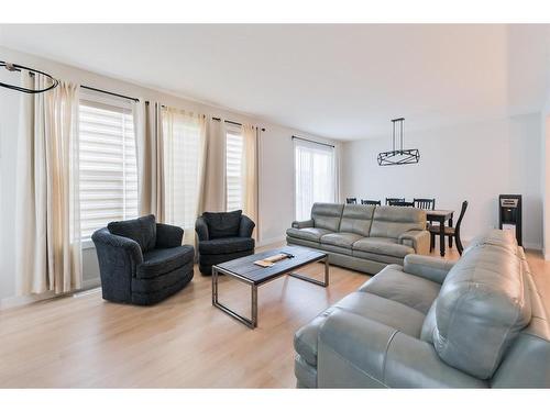 153 Cranbrook Cove Se, Calgary, AB - Indoor Photo Showing Living Room