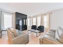 153 Cranbrook Cove Se, Calgary, AB  - Indoor Photo Showing Living Room 