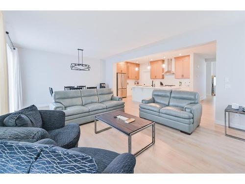 153 Cranbrook Cove Se, Calgary, AB - Indoor Photo Showing Living Room