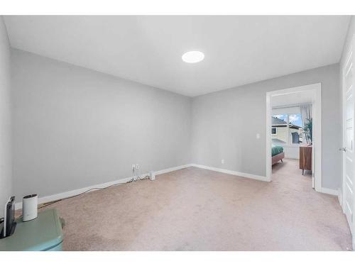 256 Willow Corner, Cochrane, AB - Indoor Photo Showing Other Room