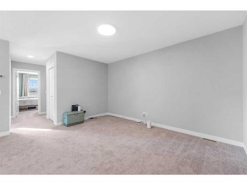 256 Willow Corner, Cochrane, AB - Indoor Photo Showing Other Room